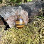 Pendentif un œil de tigre, pierre de protection